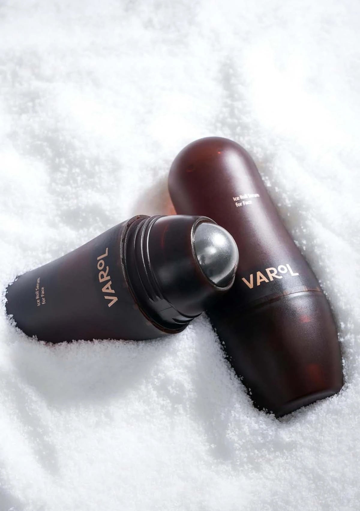 Two brown bottles with 'VAROL' branding on a white textured background